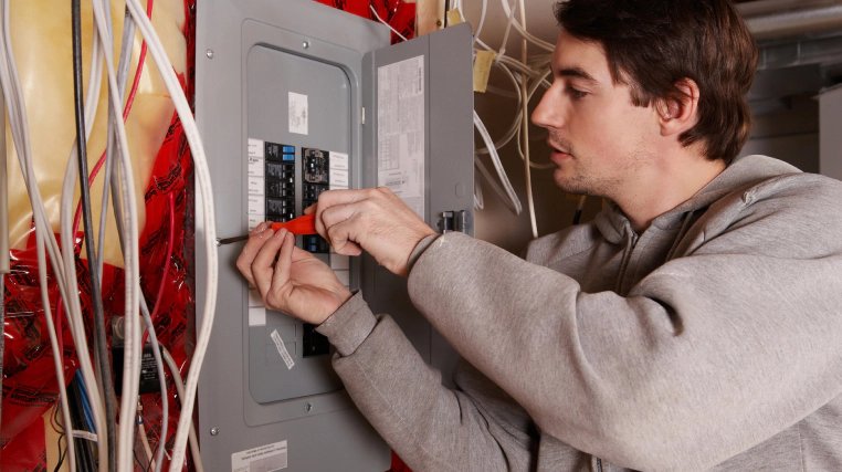 electrician opening up an electric panel bellvue co